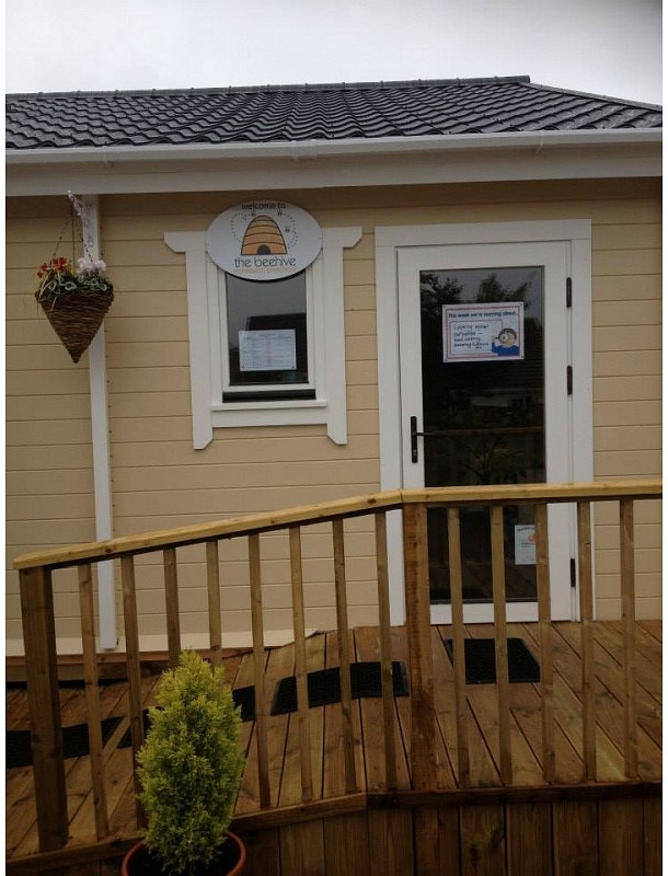 Beehive Pre-School Log Cabin Entrance