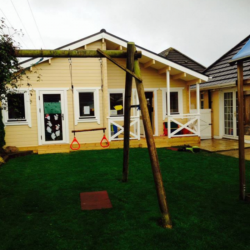 Beehive Pre-School Log Cabin Front